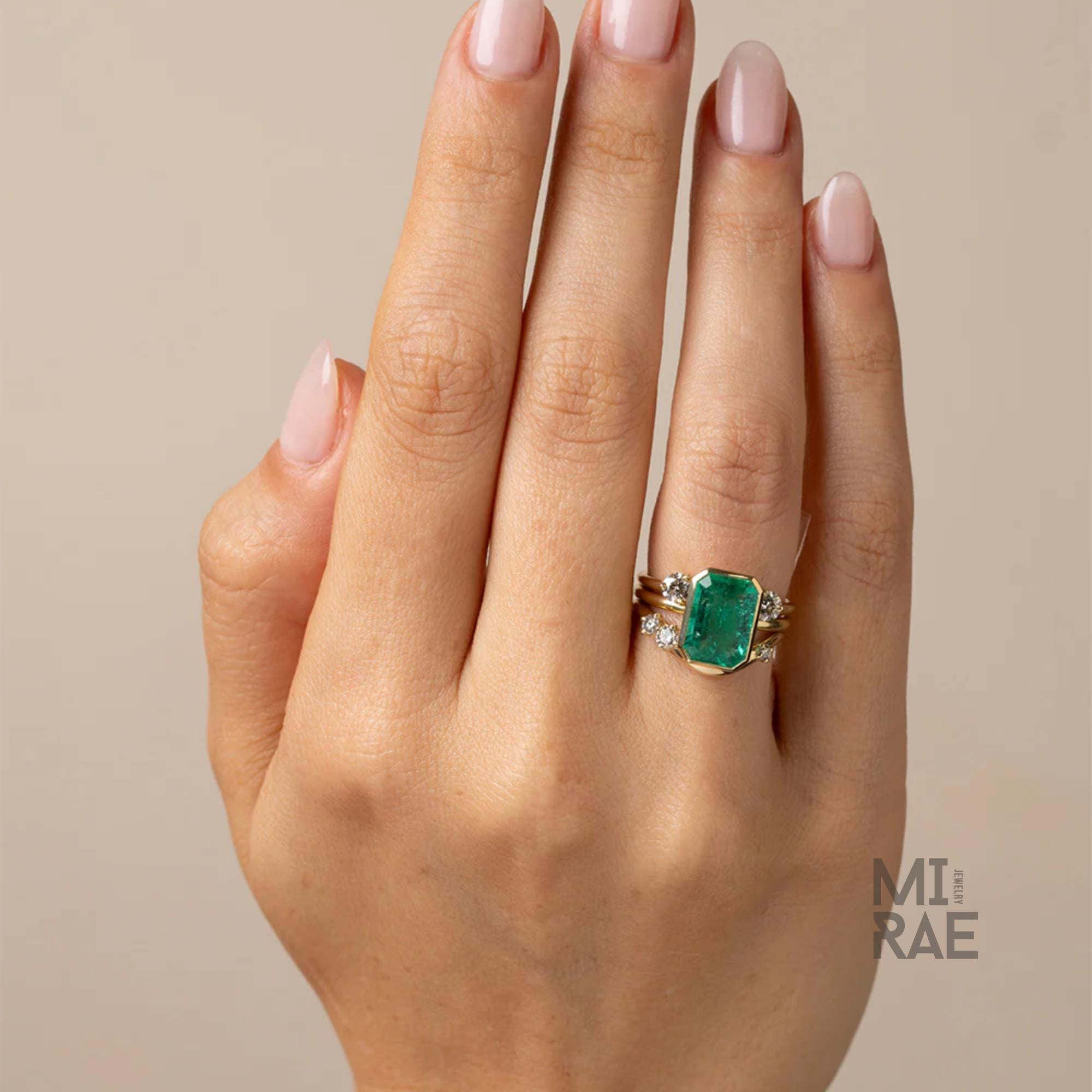 3CT Emerald Cut Emerald Ring: 18K Yellow Gold Bezel Solitaire