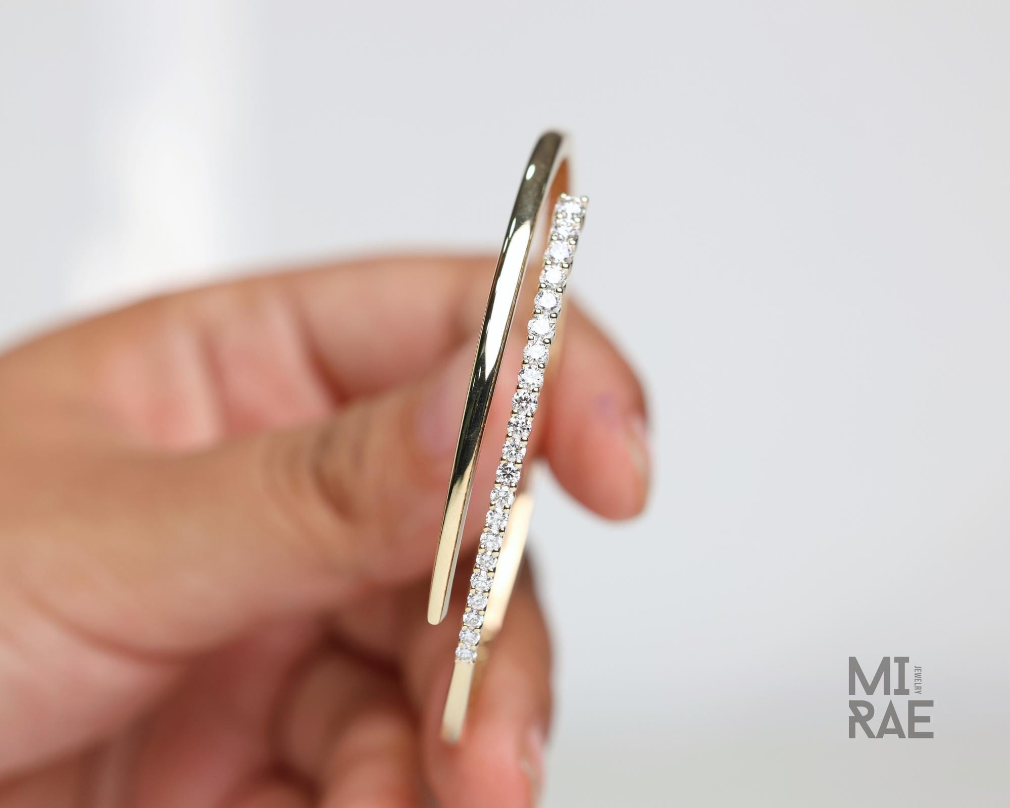 14K Gold Diamond Bangle Bracelet: 1ct Graduated Crossover Design