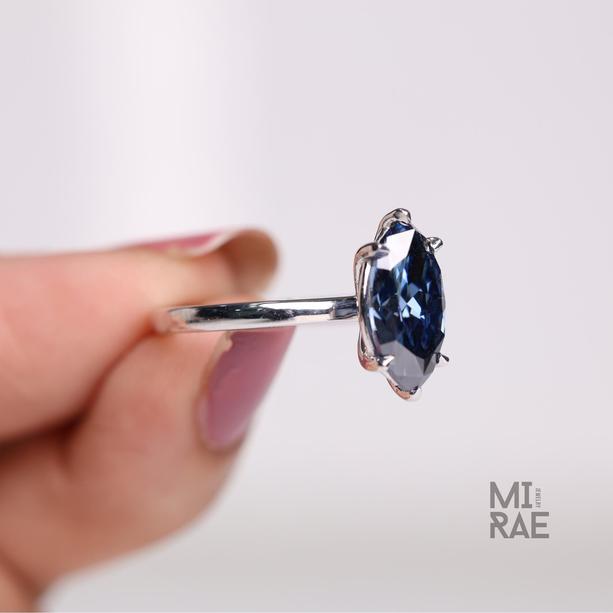 Cyan Blue Marquise Moissanite Ring: Ethical Sterling Silver Engagement Jewelry