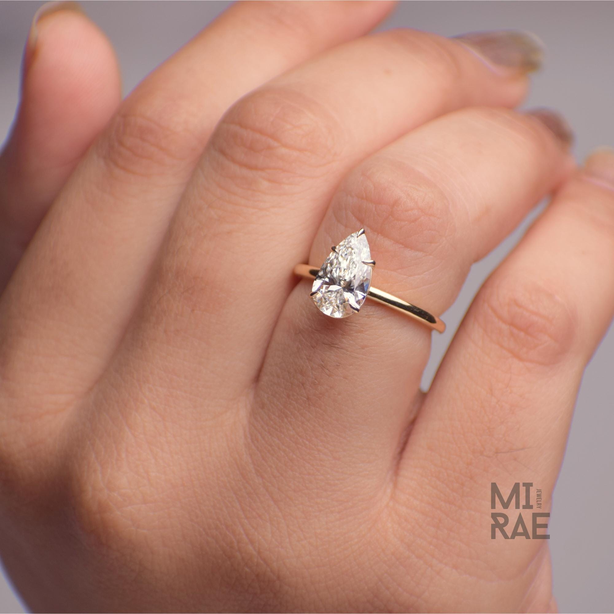 2 Carat Pear Cut Lab Grown Diamond Ring: 14K Gold Solitaire