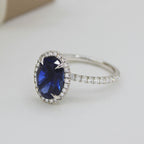 Oval Blue Sapphire Engagement Ring: 18K White Gold Halo, Moissanite Accents