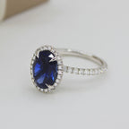 Oval Blue Sapphire Engagement Ring: 18K White Gold Halo, Moissanite Accents
