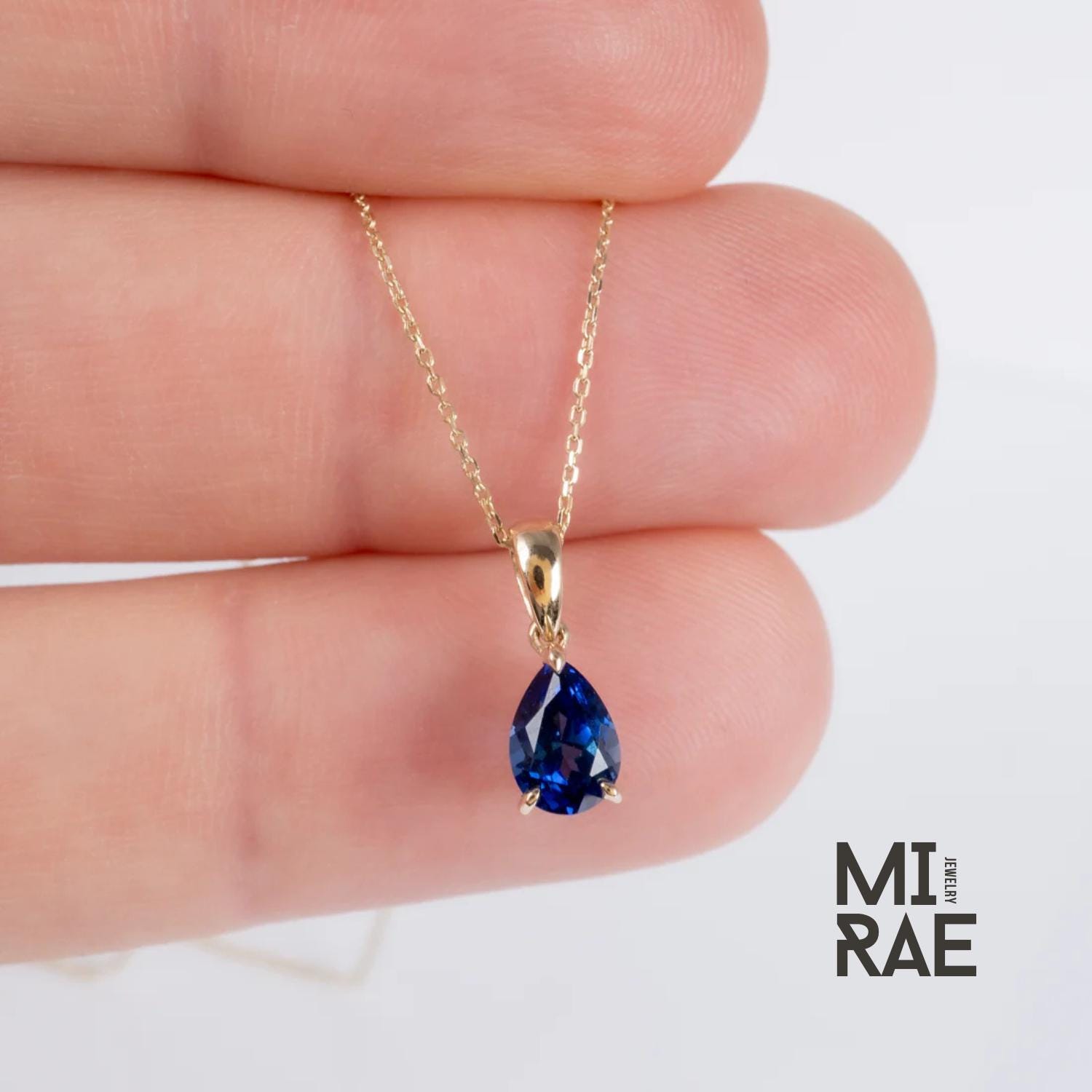 10K Gold Pear Cut Birthstone Pendant: Sapphire, Ruby, Emerald