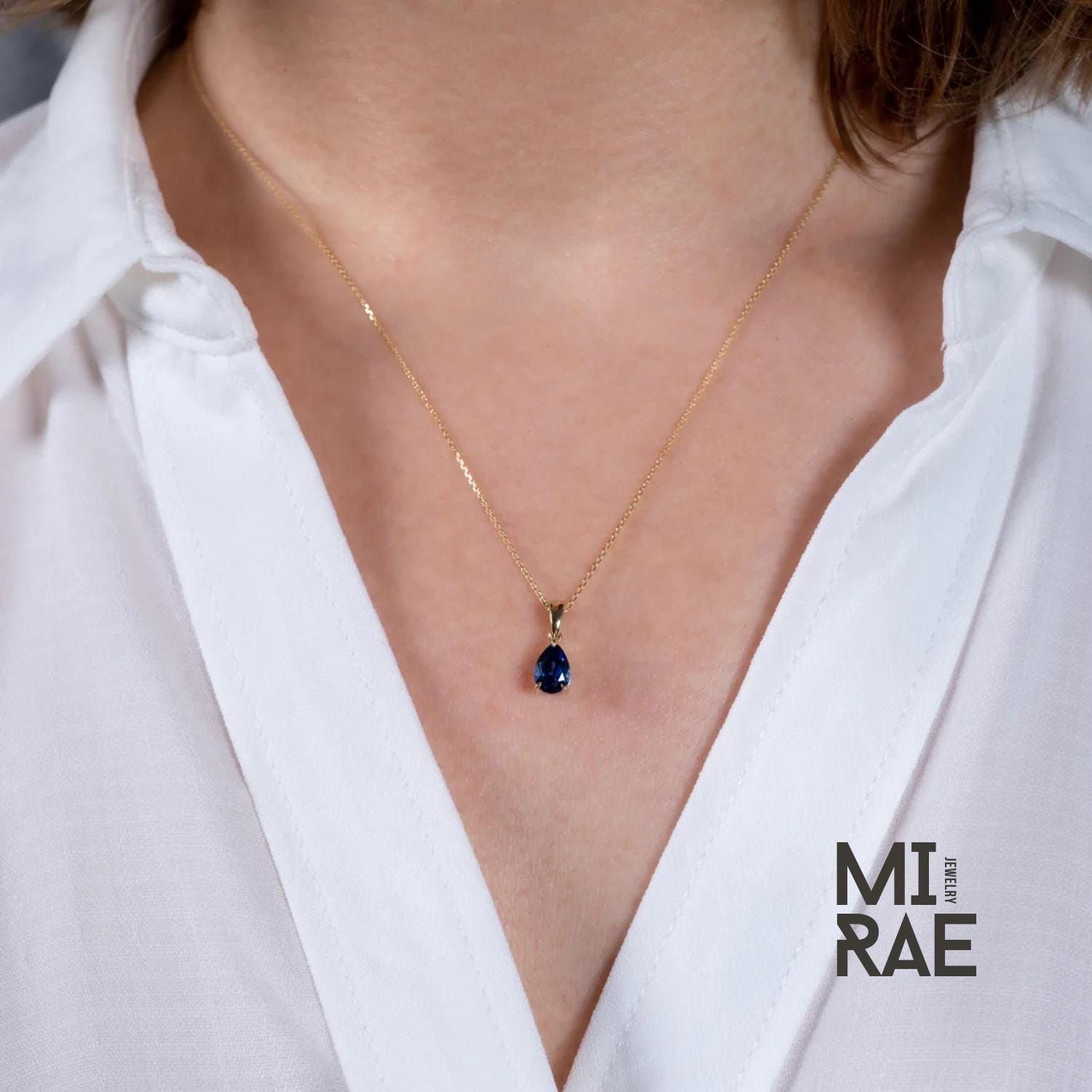 10K Gold Pear Cut Birthstone Pendant: Sapphire, Ruby, Emerald