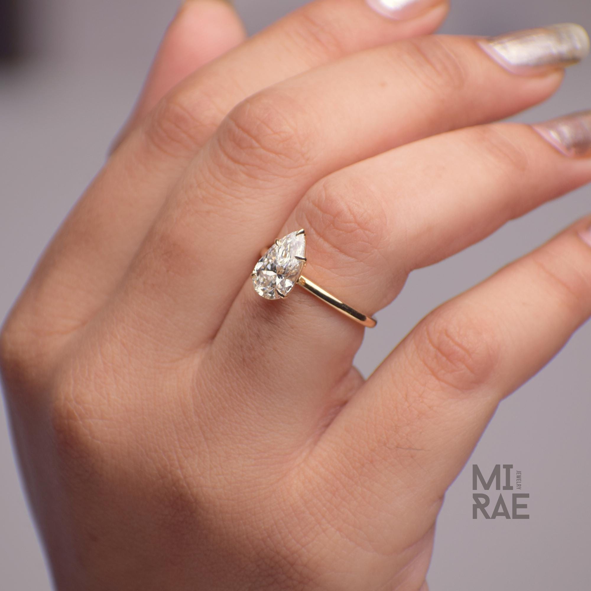 2 Carat Pear Cut Lab Grown Diamond Ring: 14K Gold Solitaire