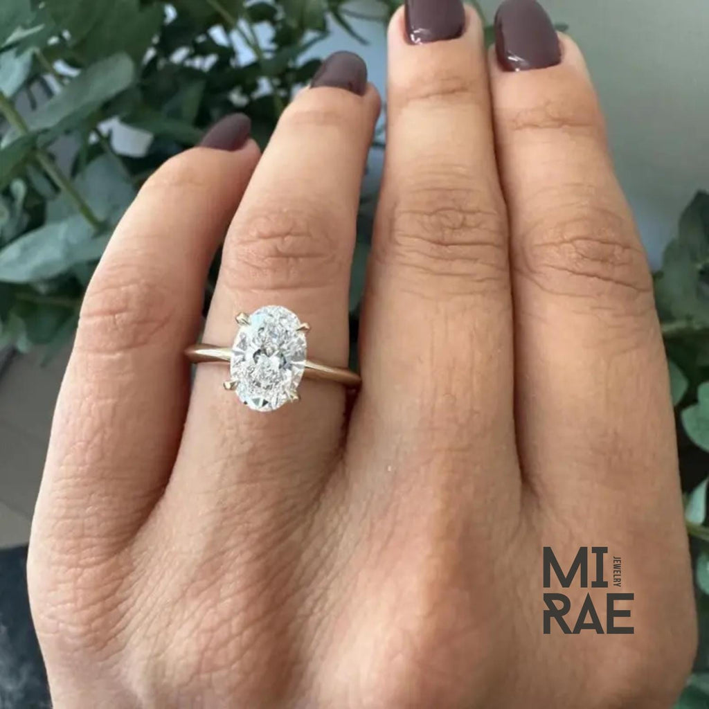 Oval Moissanite Engagement Ring: 14k Yellow Gold Solitaire, Four Prong