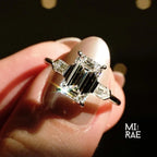 Emerald Cut Moissanite Three Stone Ring: 18K White Gold & Baguette Accents