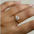 2 Carat Pear Moissanite East-West Ring: Wavy Band, Sterling Silver or Gold