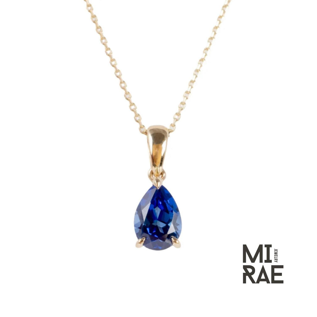 10K Gold Pear Cut Birthstone Pendant: Sapphire, Ruby, Emerald