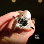 Emerald Cut Moissanite Three Stone Ring: 18K White Gold & Baguette Accents