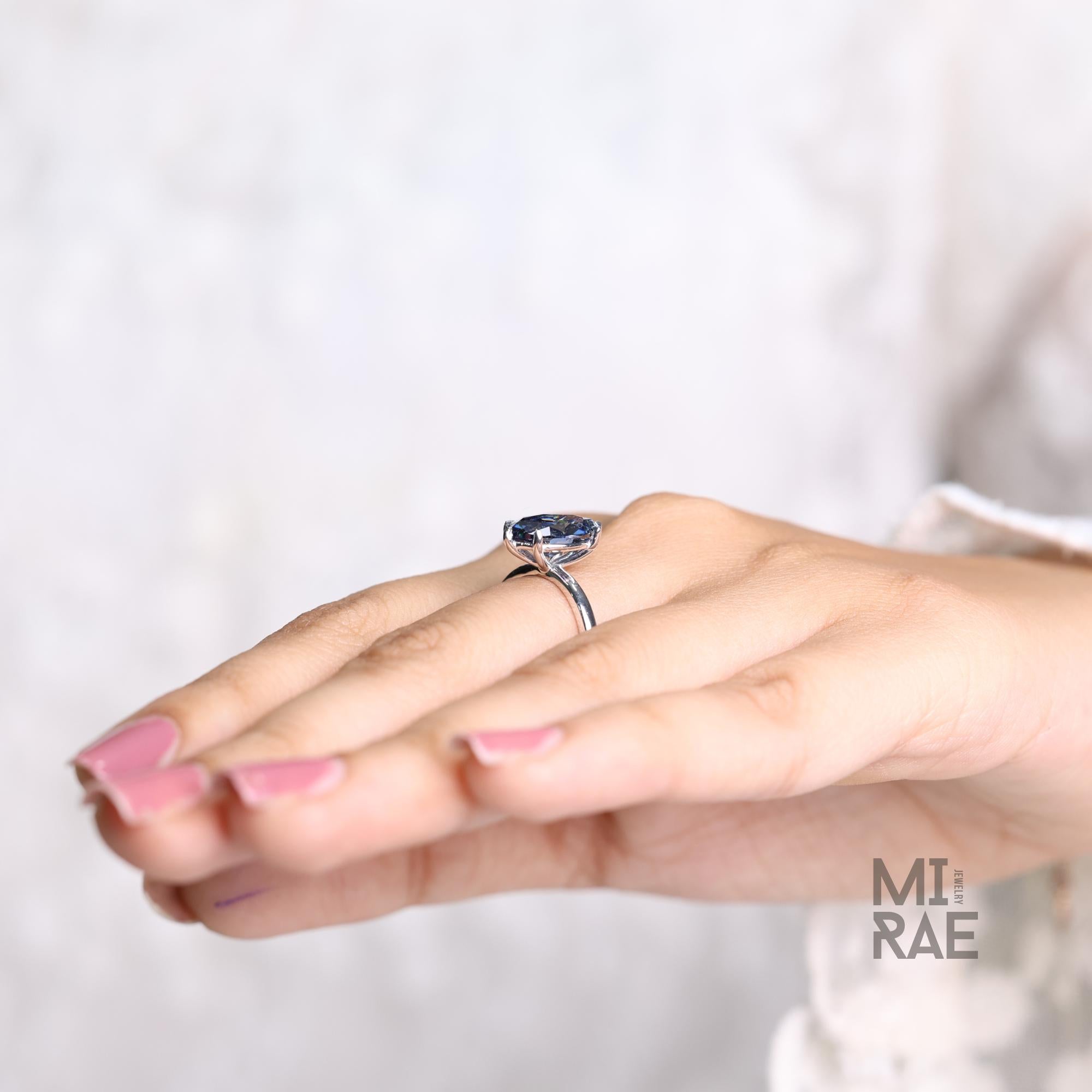 Cyan Blue Marquise Moissanite Ring: Ethical 14K Gold Engagement Jewelry