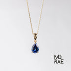 10K Gold Pear Cut Birthstone Pendant: Sapphire, Ruby, Emerald