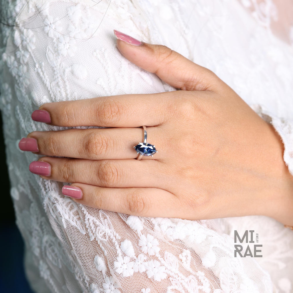 Cyan Blue Marquise Moissanite Ring: Ethical Sterling Silver Engagement Jewelry